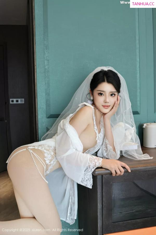  [XiuRen]高清写真图 2025.07.18 No.10559 糯梨子 白色婚纱第23张图片